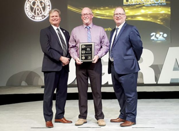 Dave Young receiving a Long Service Award