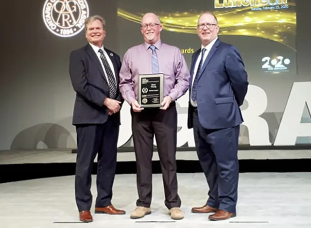Dave Young receiving a Long Service Award