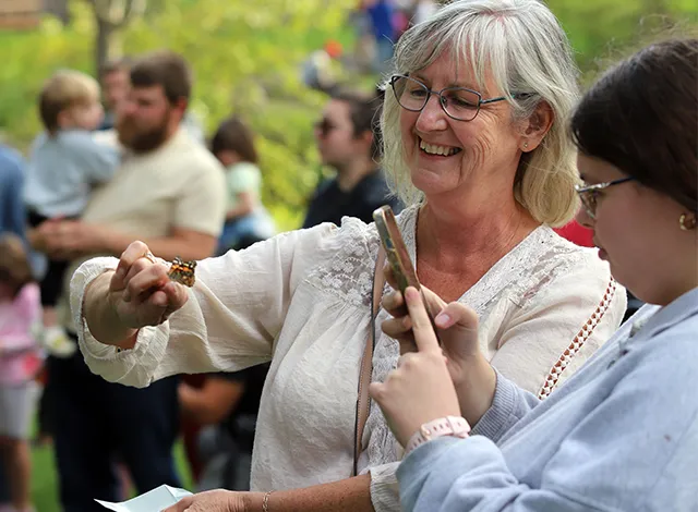 butterfly-heather-griffith Heather Griffith releases a butterfly during an event