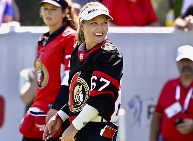 Brooke HEnderson Sens Brooke Henderson wearing Sens jersey.