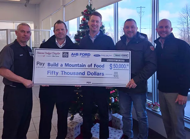 Hinton Auto Group present cheque to BAM of Food campaign.