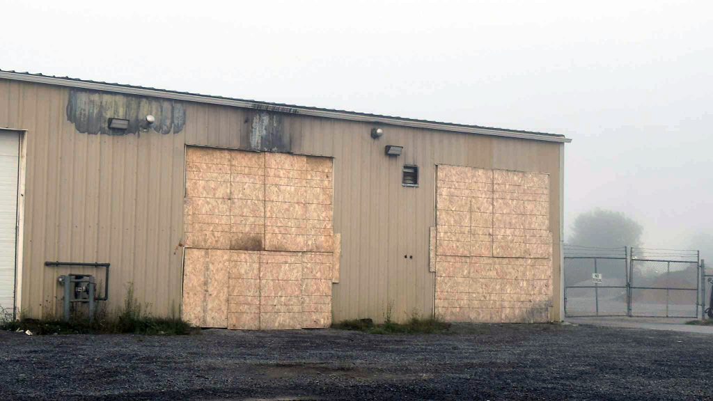 Boarded up garage doors at the Smiths Falls Public Works Garage.