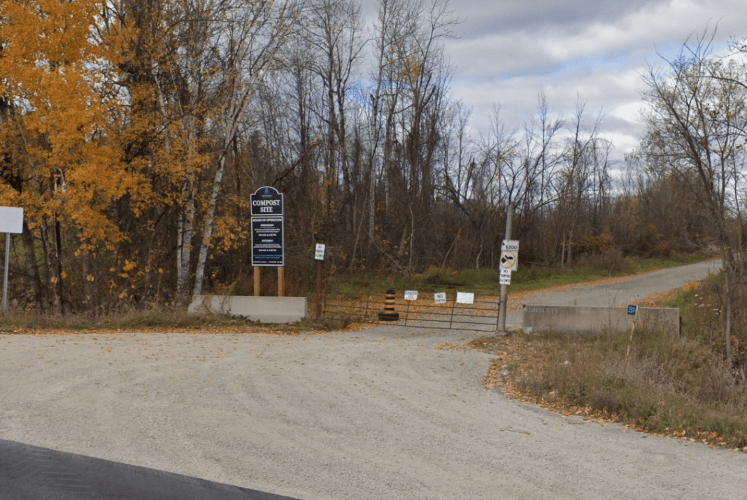 Street view of the gate and sign for at the entrance of the Smiths Falls compost site